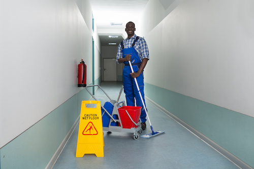 janitor mopping floor